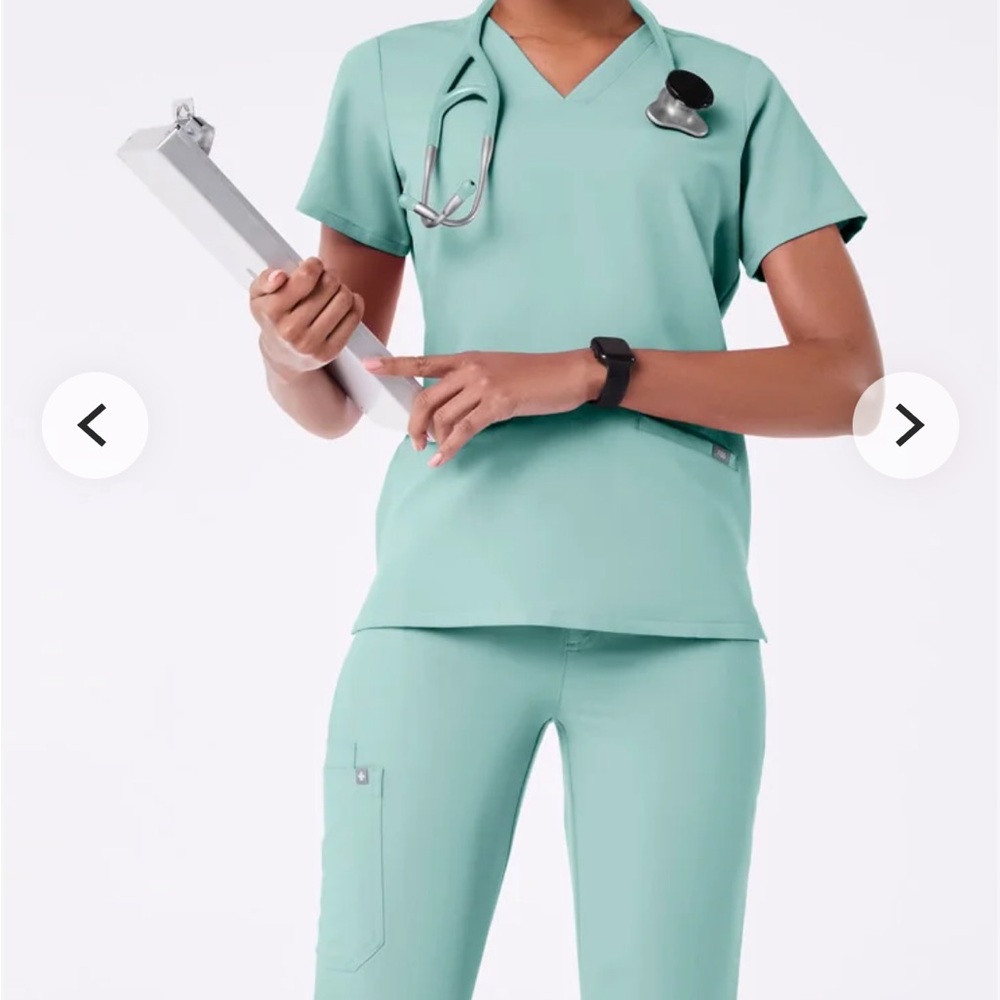 Baby blue FIGS Medical Scrub Top.